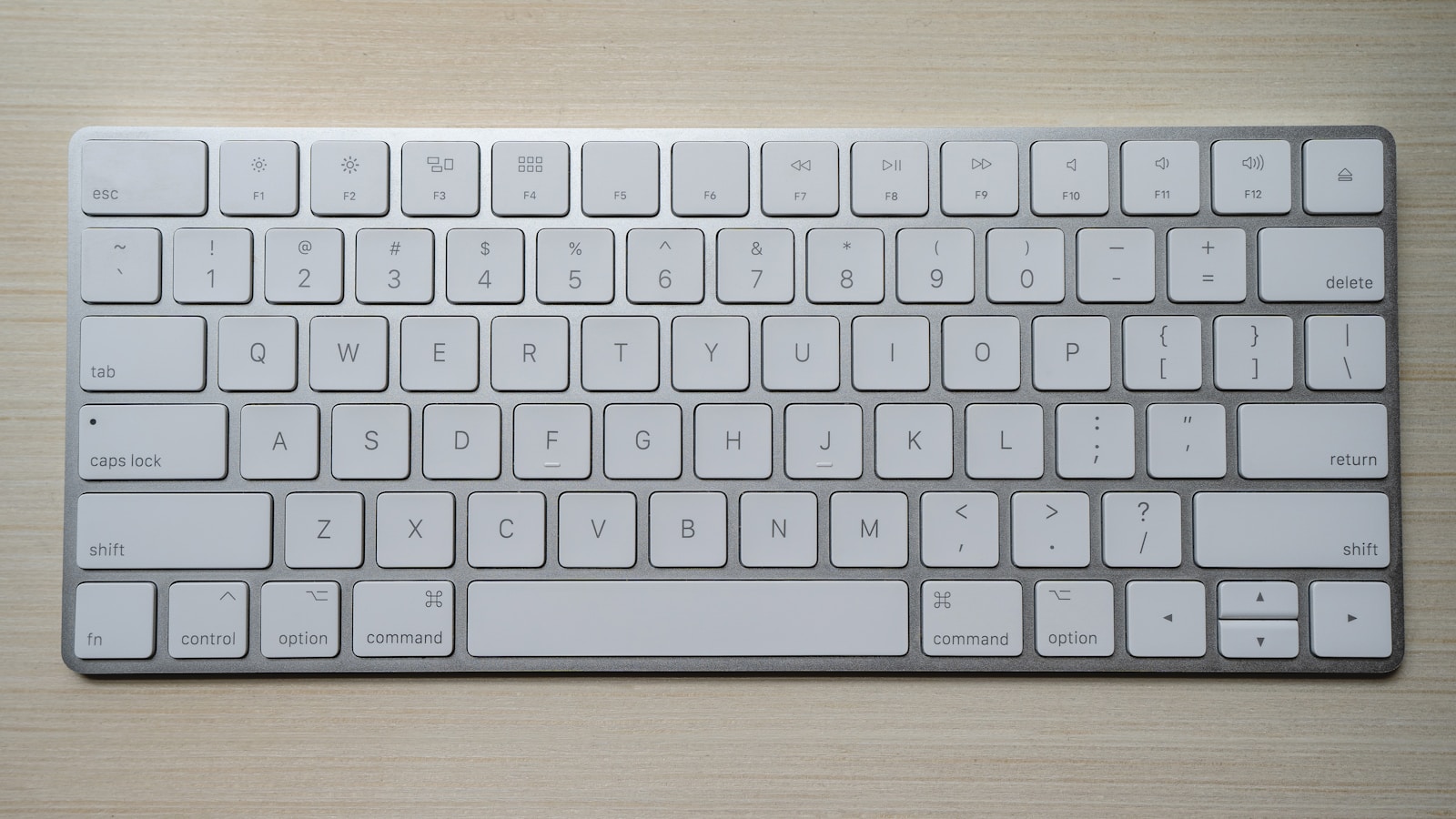 Close-up of ergonomic mechanical keyboard representing sub-50ms Cmd+K command palette navigation in SaaS applications